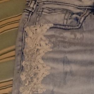 Boyfriend fit. Super cute lace details!